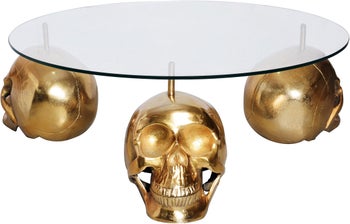Stolik kawowy ze szklanym blatem i złotą podstawą z czaszkami Ø90 cm – grafika-1.